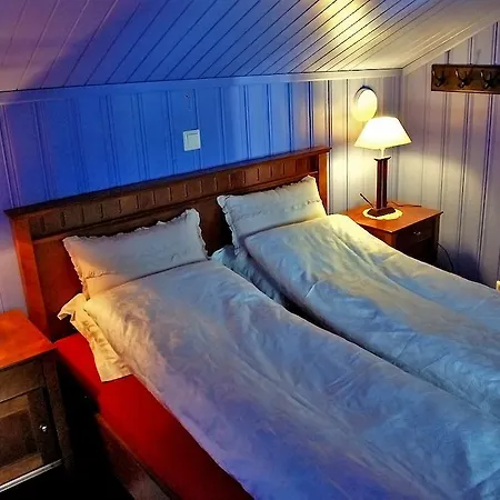 Regnbuegarden * روروس